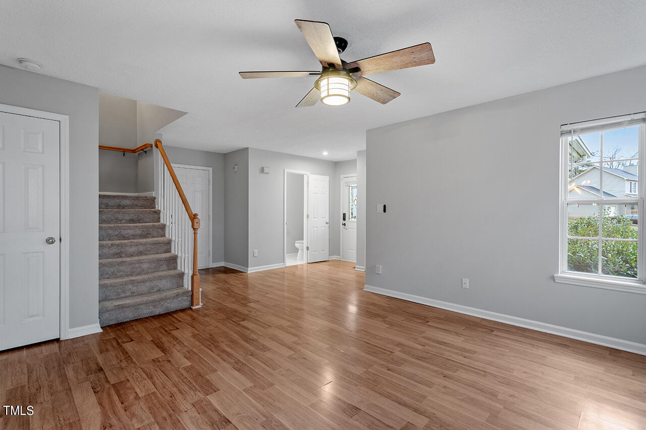 4101 Mardela Spring Drive Raleigh, NC 27616 - Photo 3 of 36 wooden floor in an empty room with a window