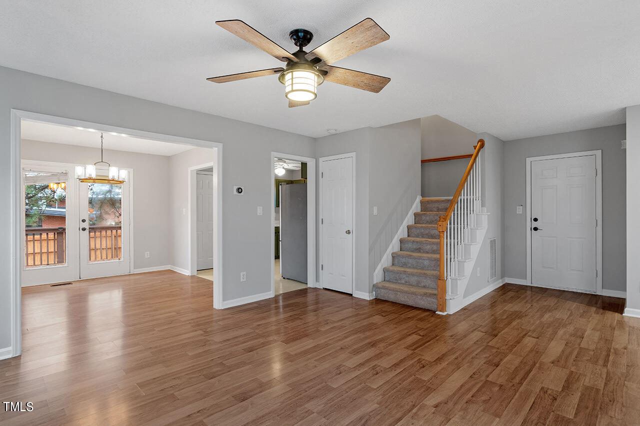 4101 Mardela Spring Drive Raleigh, NC 27616 - Photo 9 of 36 wooden floor in an empty room with a window