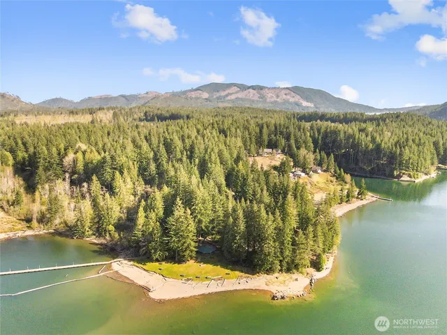 a view of an ocean from a mountain