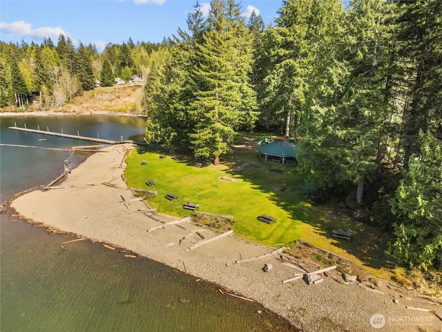a view of a swimming pool with a yard