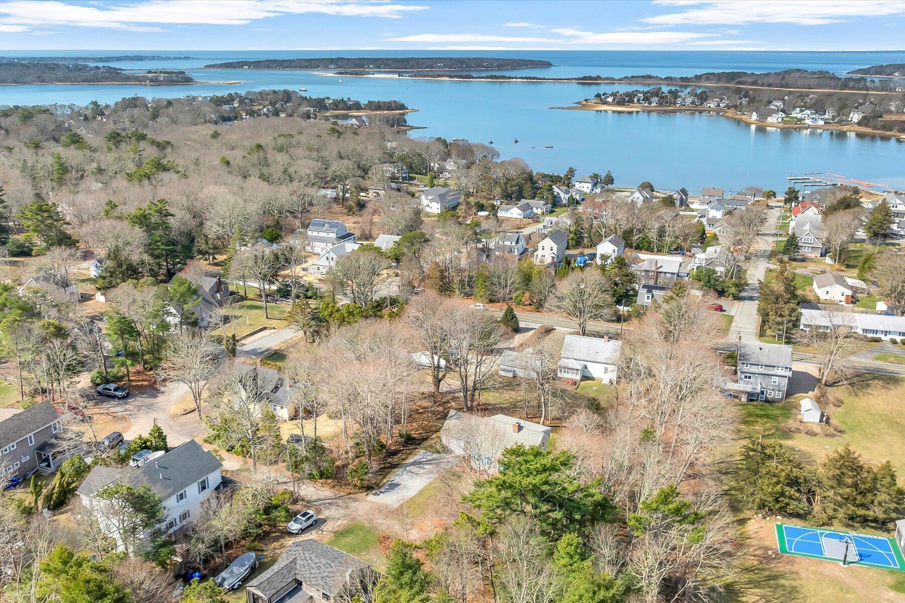 4 Quail Hill Road Pocasset, MA 02559 - Photo 33 of 38 Aerial view of house to water