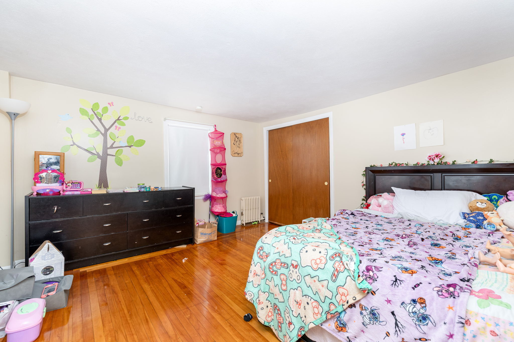 409 Main Street Killingly, CT 06239 - Photo 11 of 39 a bedroom with a bed and a dresser