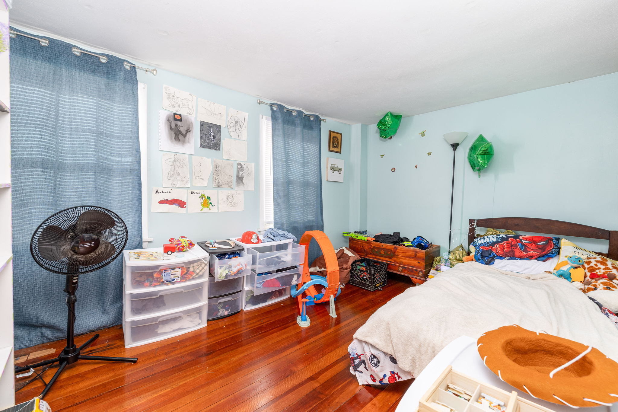 409 Main Street Killingly, CT 06239 - Photo 12 of 39 a bedroom with furniture and a wooden floor