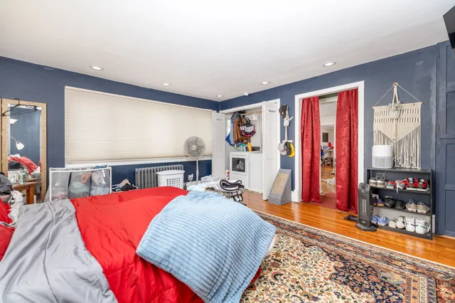 a bed room with a bed and a couch