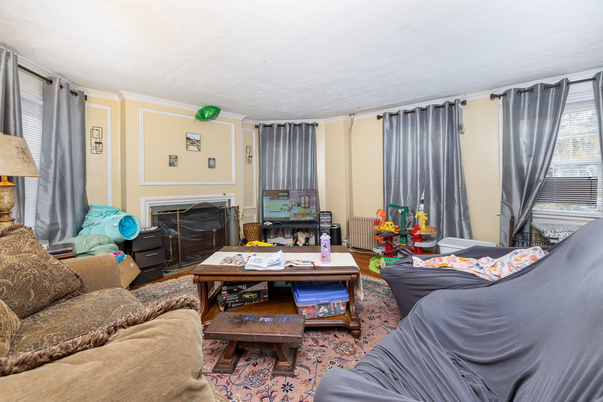 409 Main Street Killingly, CT 06239 - Photo 20 of 39 a living room with furniture and a fireplace