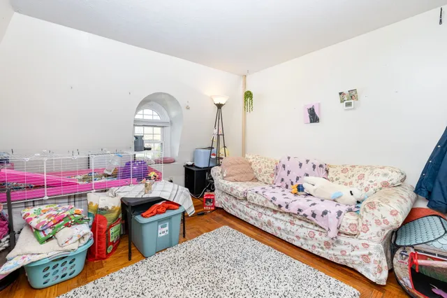 a bed room with a bed and a couch