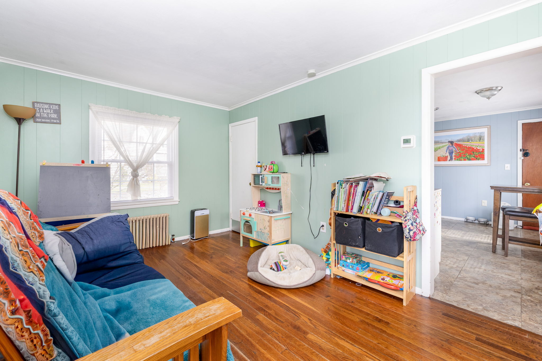 409 Main Street Killingly, CT 06239 - Photo 24 of 39 a living room with furniture and a flat screen tv