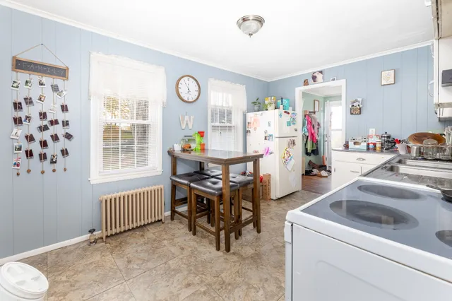 a room that has a lot of furniture and a chair in it