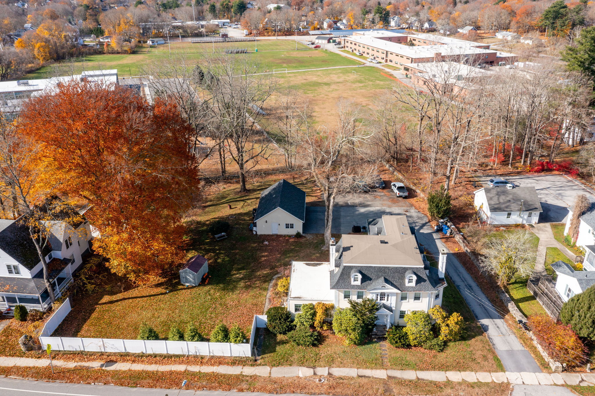 409 Main Street Killingly, CT 06239 - Photo 3 of 39 a view of a lake with a yard and large trees