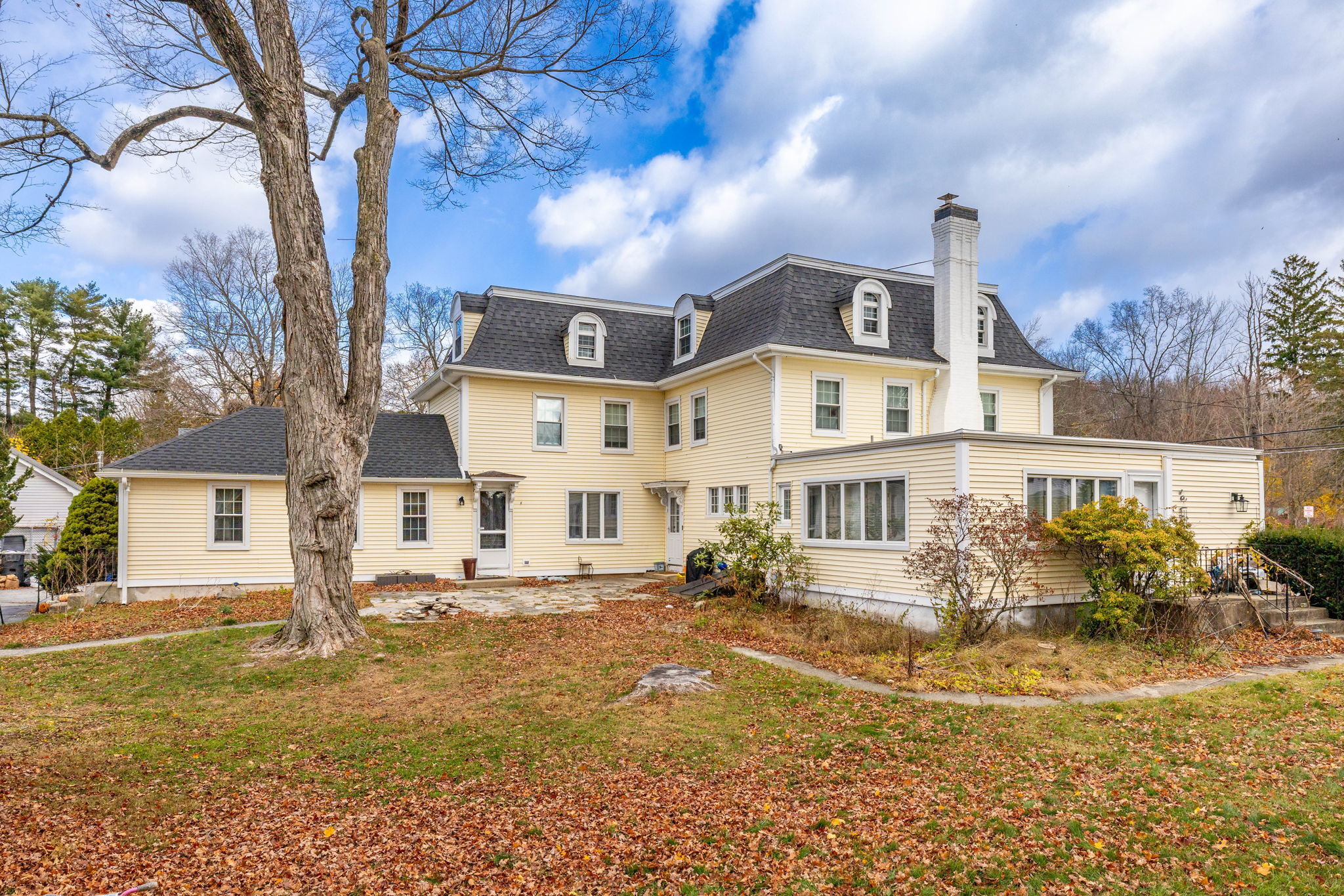 409 Main Street Killingly, CT 06239 - Photo 32 of 39 a front view of a house with a yard