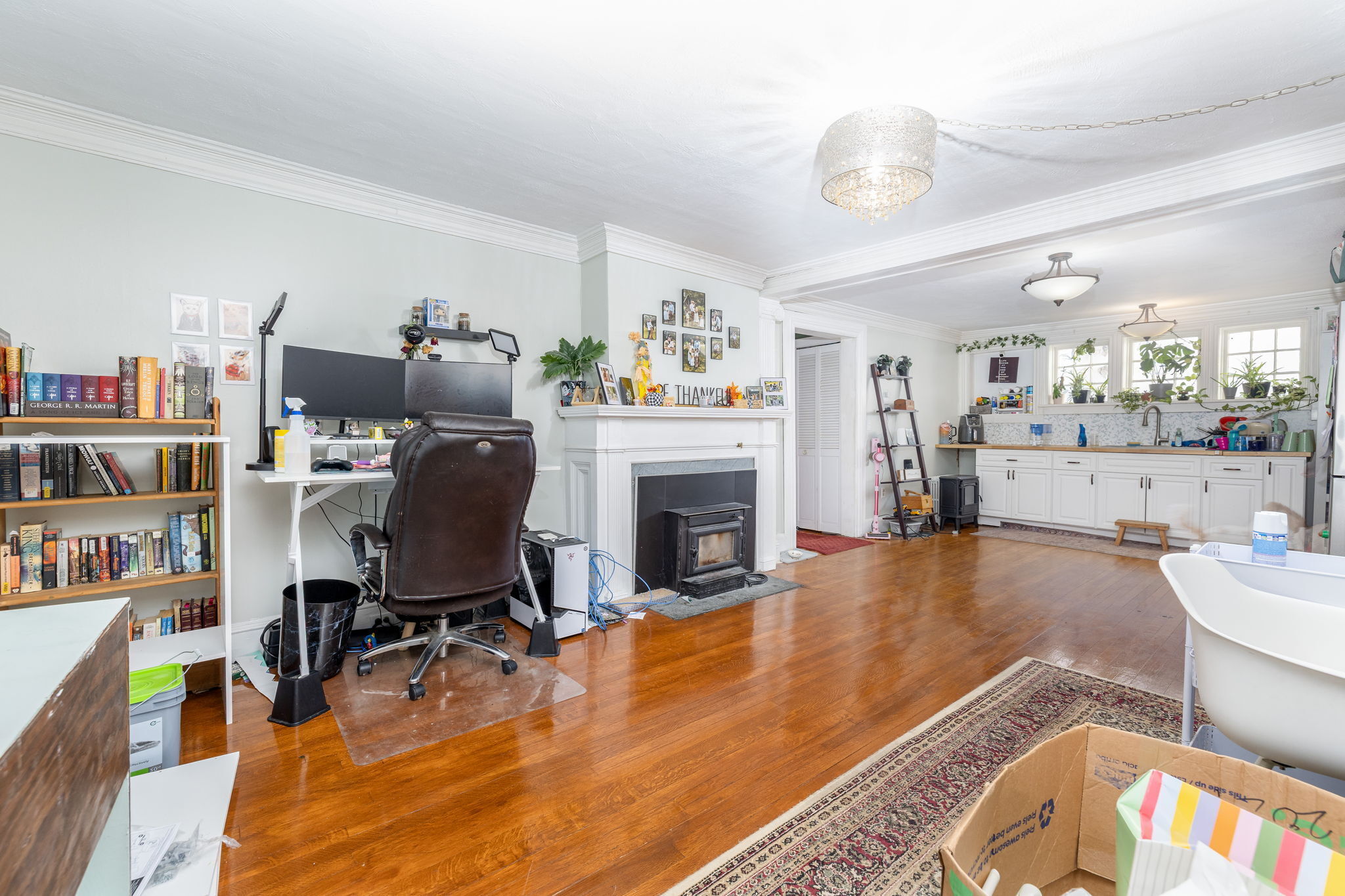 409 Main Street Killingly, CT 06239 - Photo 7 of 39 a living room with furniture and a fireplace