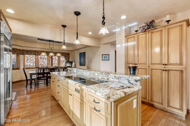 a couple of potted plants in front of door