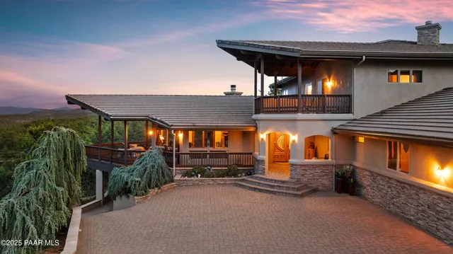 a large kitchen with lots of counter space dining table and chairs