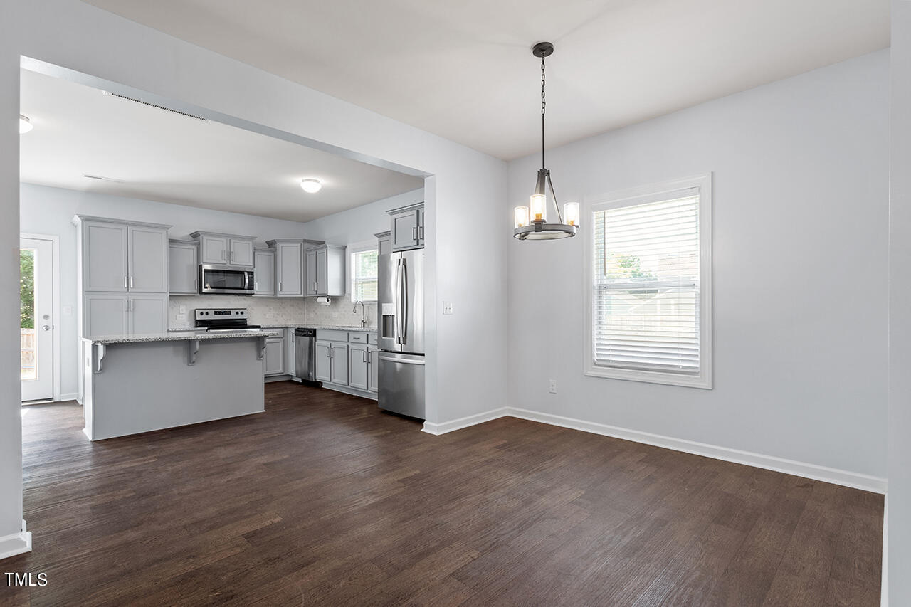 147 Pineapple Place Benson, NC 27504 - Photo 4 of 20 a view of kitchen and windows