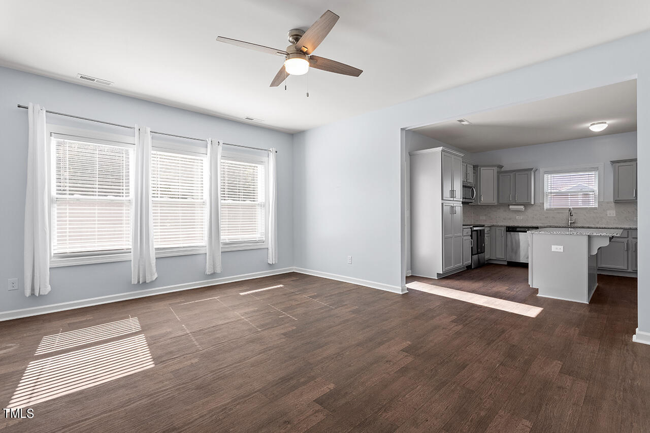 147 Pineapple Place Benson, NC 27504 - Photo 6 of 20 a view of an empty room with a window