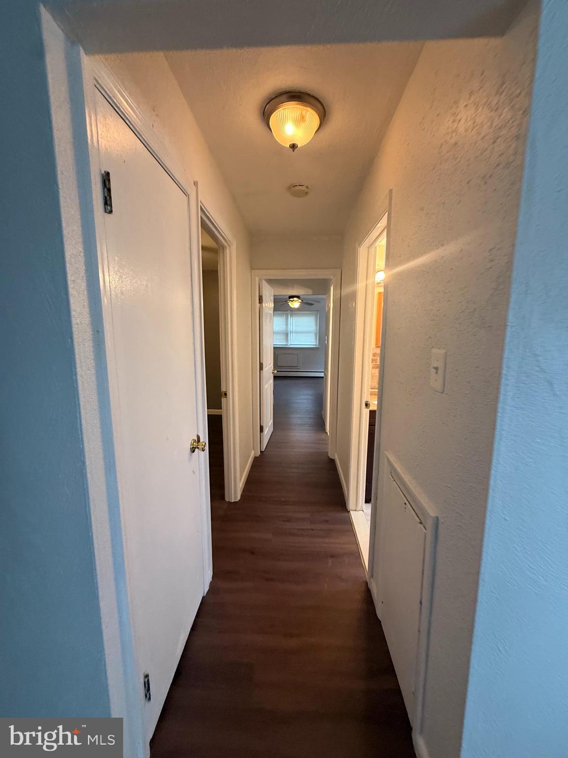 216 Boro Road, Unit A Secane, PA 19018 - Photo 16 of 26 a view of a hallway with wooden floor