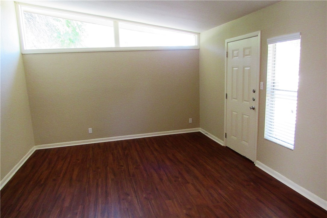 2710 St Edwards Circle Austin, TX 78704 - Photo 3 of 11 Living Room Tons of Natural Light! Fresh paint and New Flooring!!