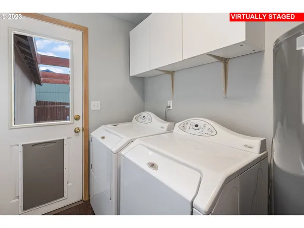 a bedroom with a bed and a desk