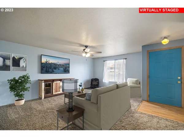 a kitchen with stainless steel appliances granite countertop a refrigerator a stove top oven a sink and dishwasher