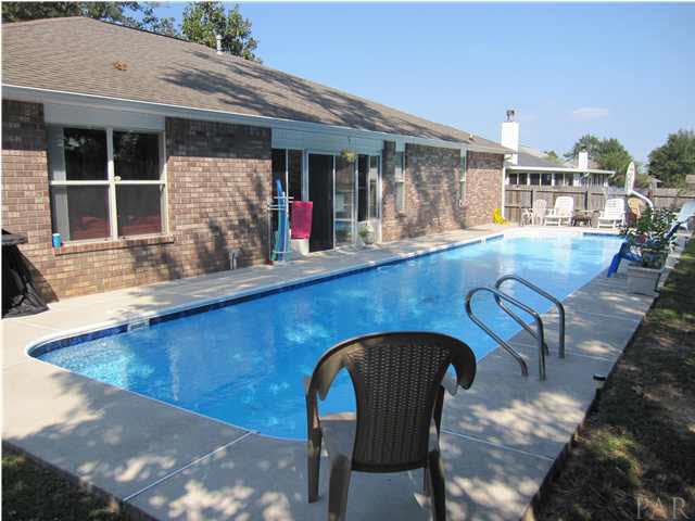 3077 Red Fern Road Cantonment, FL 32533 - Photo 23 of 25 The pool features include a Polaris, "Prozone" ozone system, 2 skimmers, 2 returns, 2 lights, corner steps in shallow end & in wall ladder.