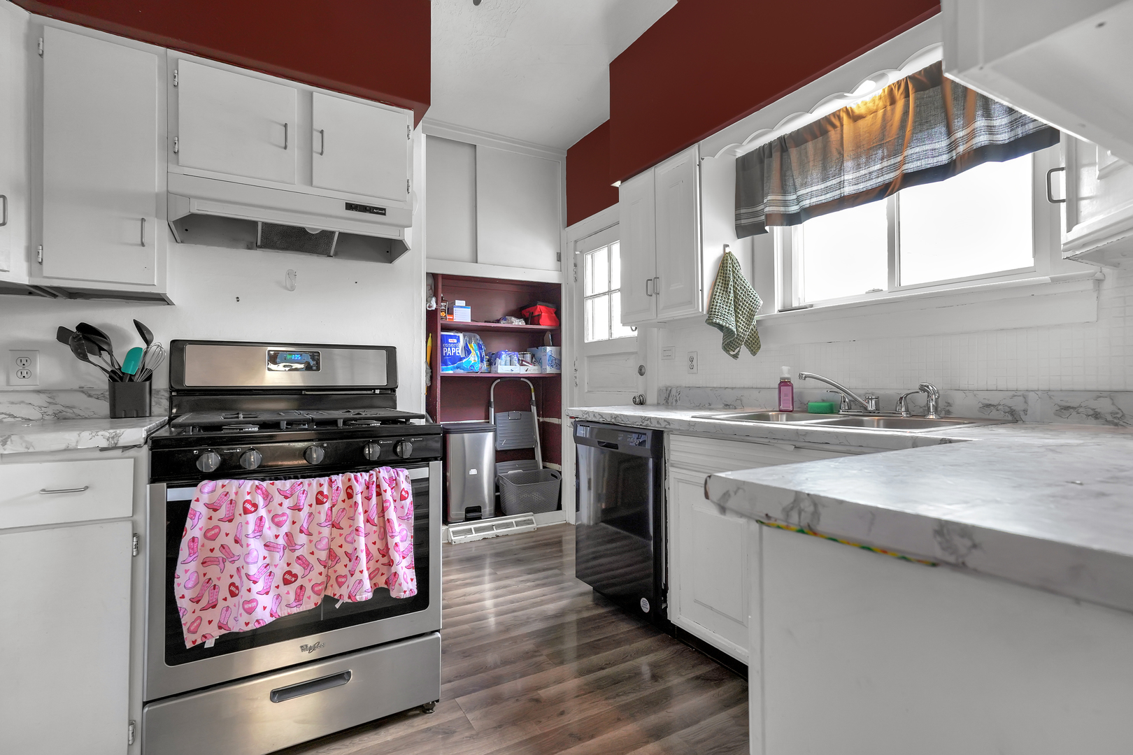 1134 South Myrtle Avenue Kankakee, IL 60901 - Photo 15 of 32 a kitchen with stainless steel appliances granite countertop a stove a sink and a microwave