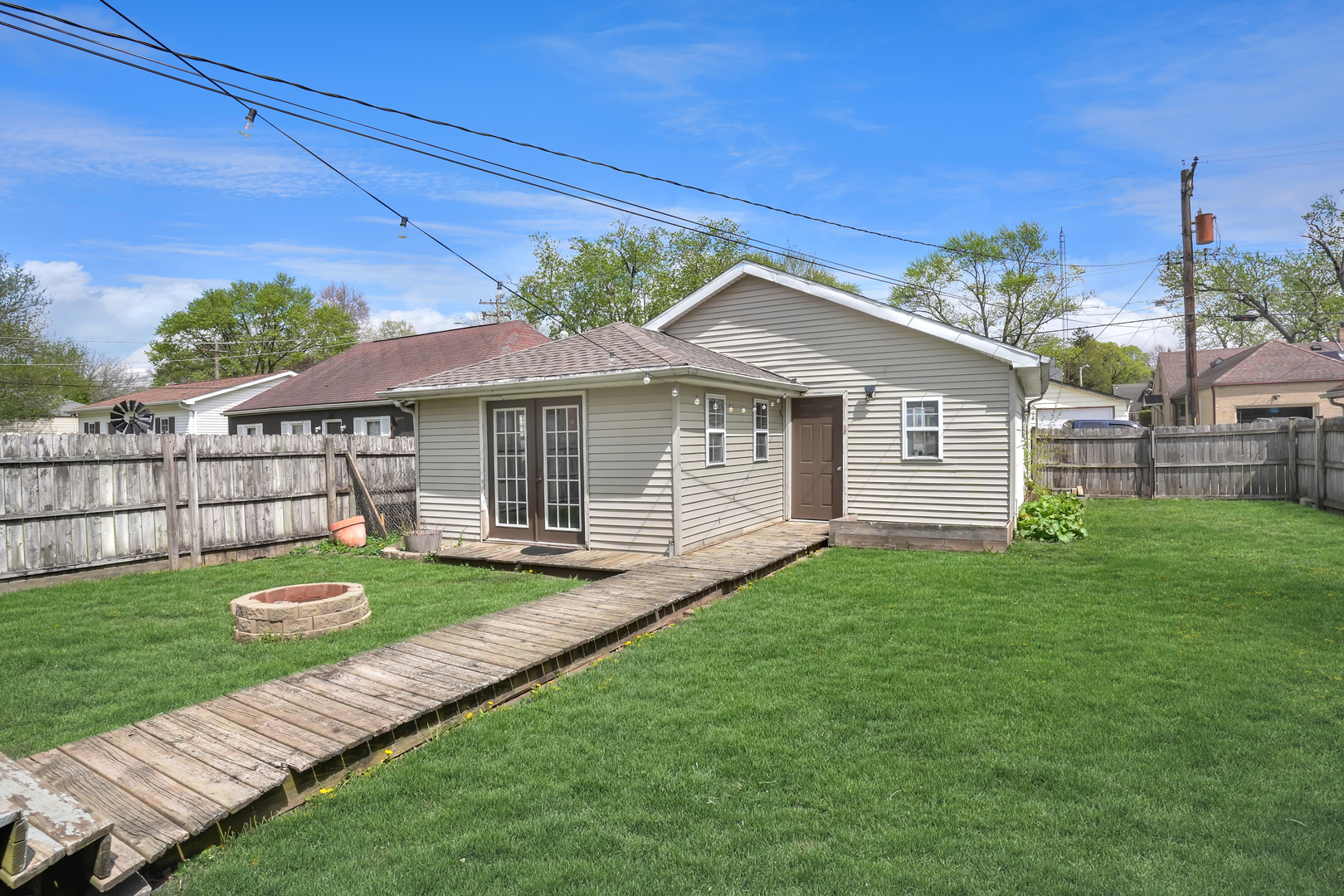 1134 South Myrtle Avenue Kankakee, IL 60901 - Photo 28 of 32 a view of a house with a backyard