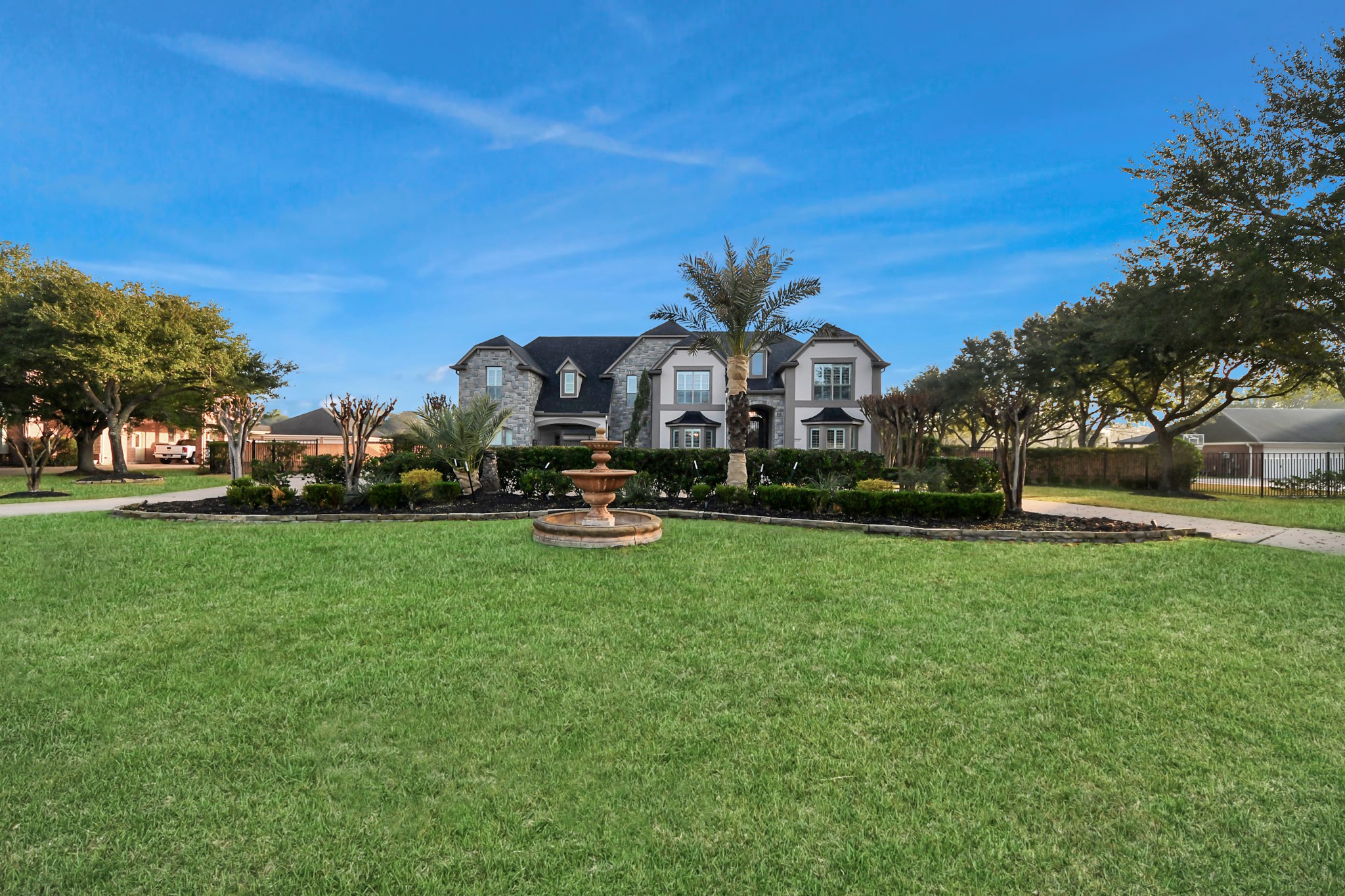 2211 Braer Ridge Drive Katy, TX 77494 - Photo 2 of 50 a front view of a house with a big yard