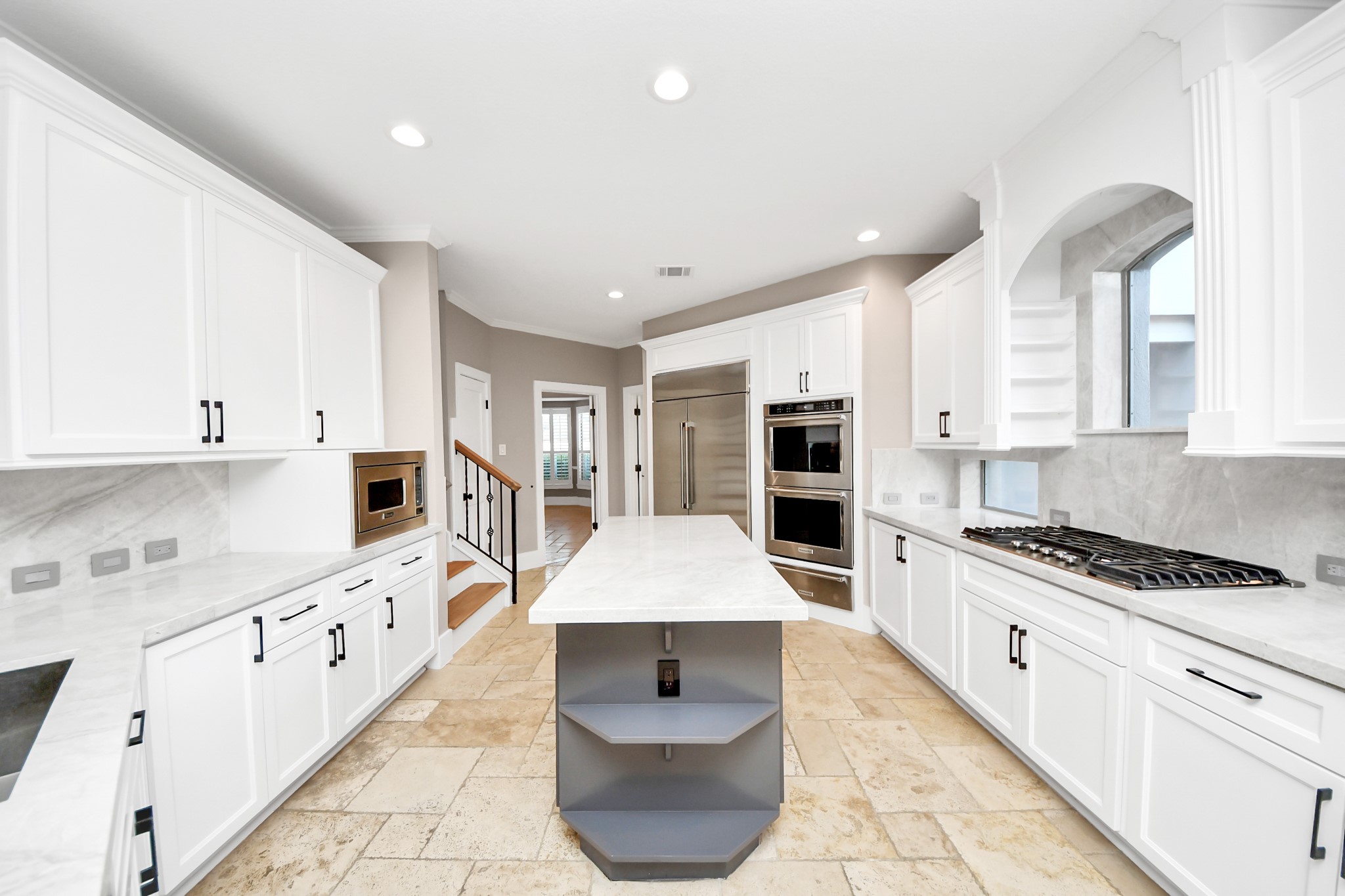 2211 Braer Ridge Drive Katy, TX 77494 - Photo 30 of 50 a kitchen with stainless steel appliances granite countertop a stove a sink and a refrigerator