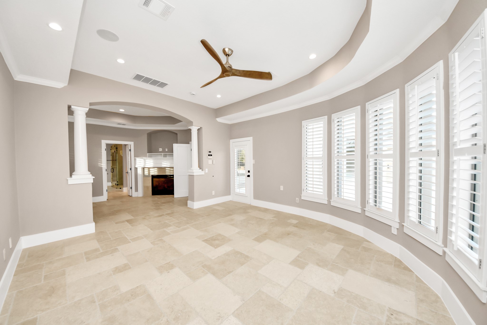 2211 Braer Ridge Drive Katy, TX 77494 - Photo 36 of 50 a view of an empty room with a fireplace and a window