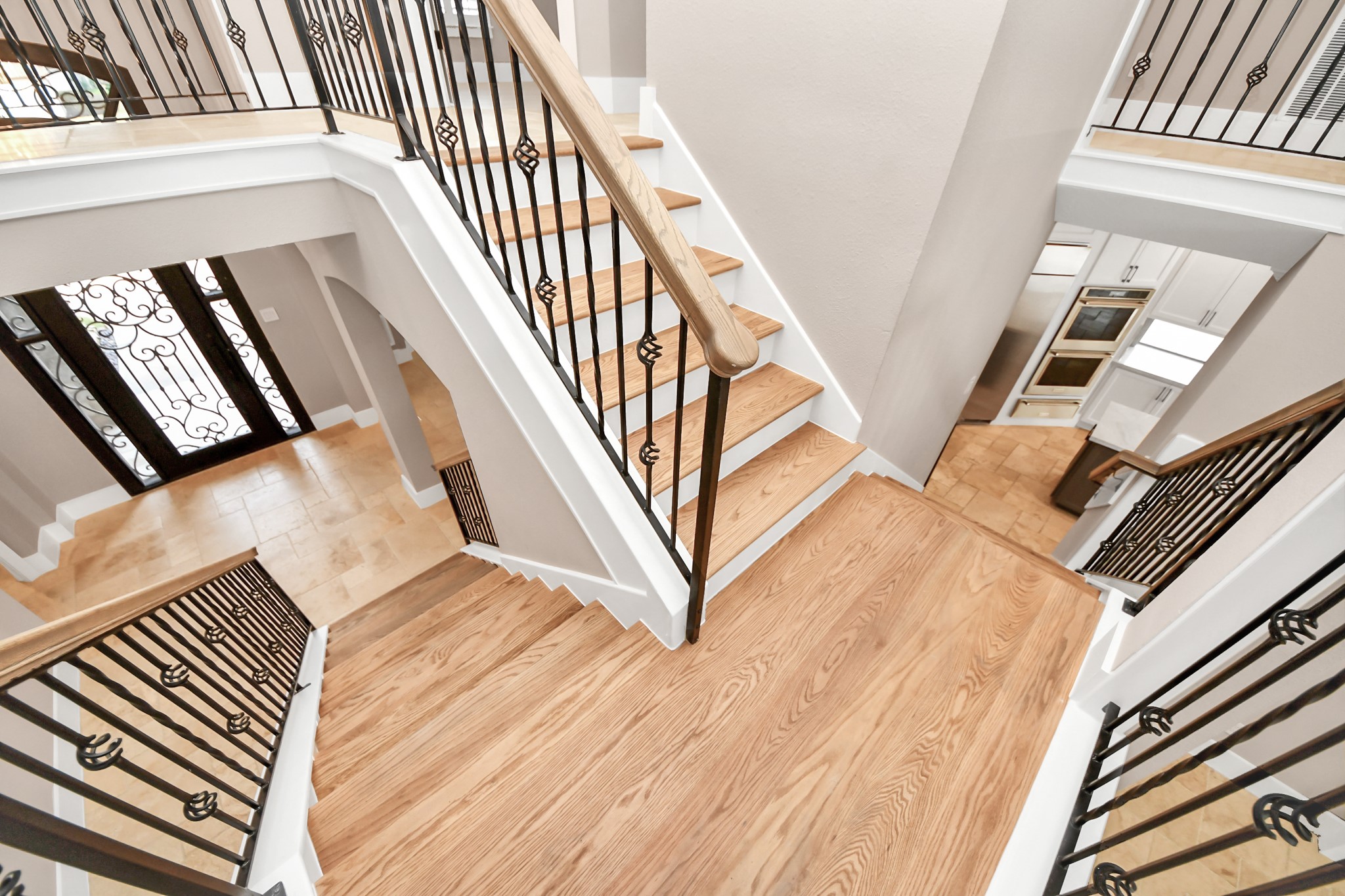 2211 Braer Ridge Drive Katy, TX 77494 - Photo 42 of 50 a view of staircase with wooden floor and a rug