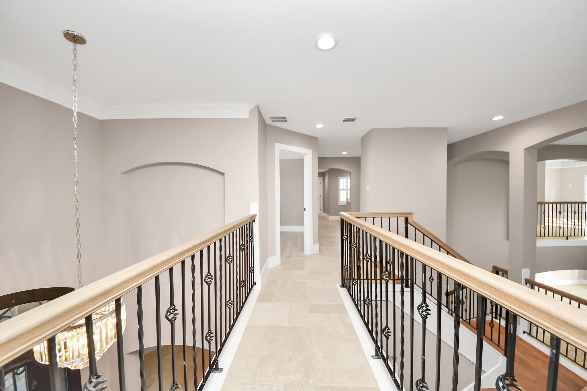 2211 Braer Ridge Drive Katy, TX 77494 - Photo 43 of 50 a view of a hallway with wooden floor and stairs