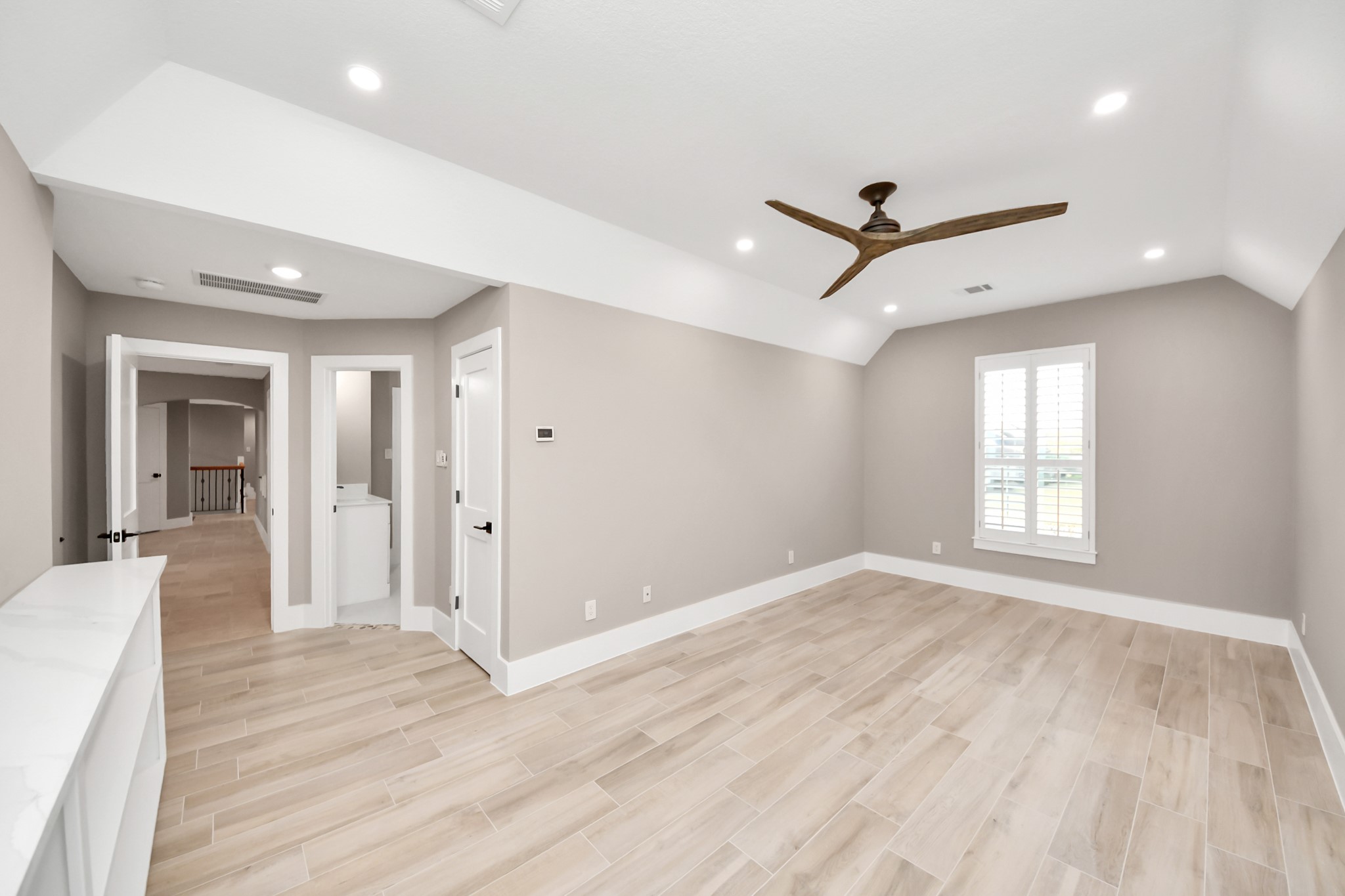 2211 Braer Ridge Drive Katy, TX 77494 - Photo 48 of 50 wooden floor in an empty room with a window