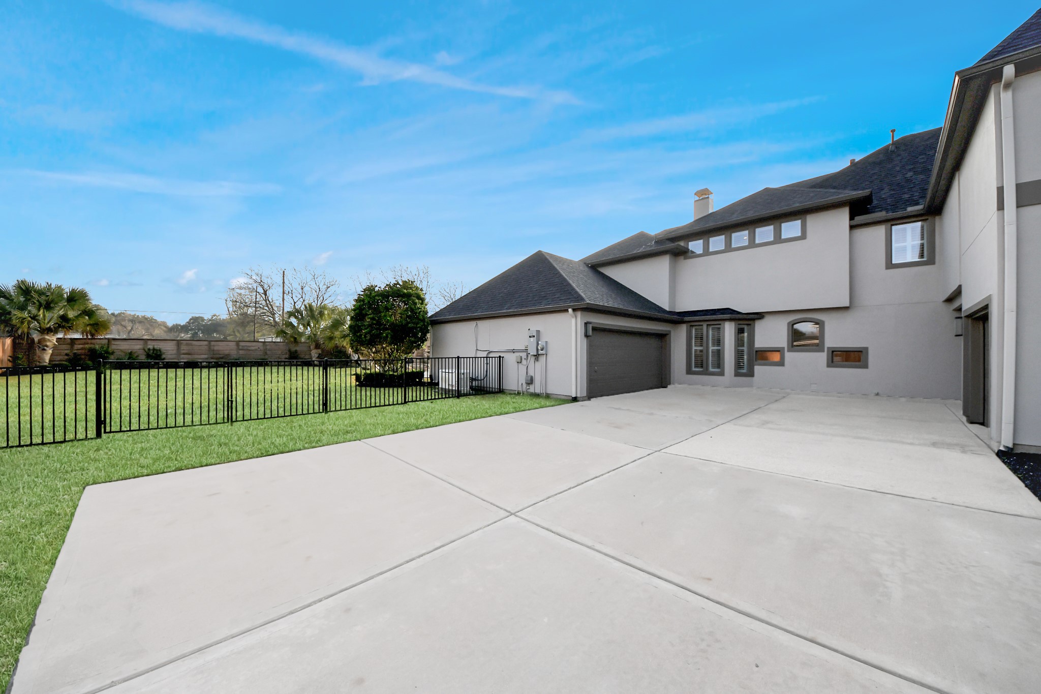 2211 Braer Ridge Drive Katy, TX 77494 - Photo 7 of 50 a view of a house with a yard and a large tree