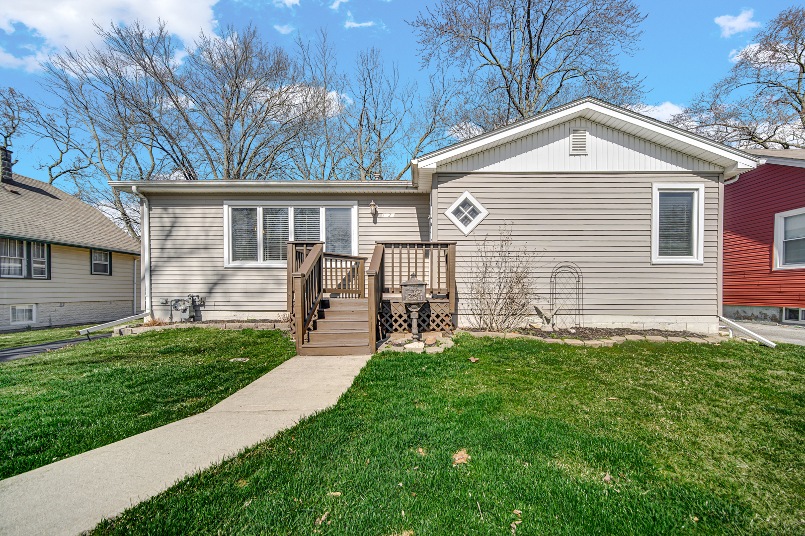 1634 Burr Oak Road Homewood, IL 60430 - Photo 1 of 36 a front view of a house with a garden
