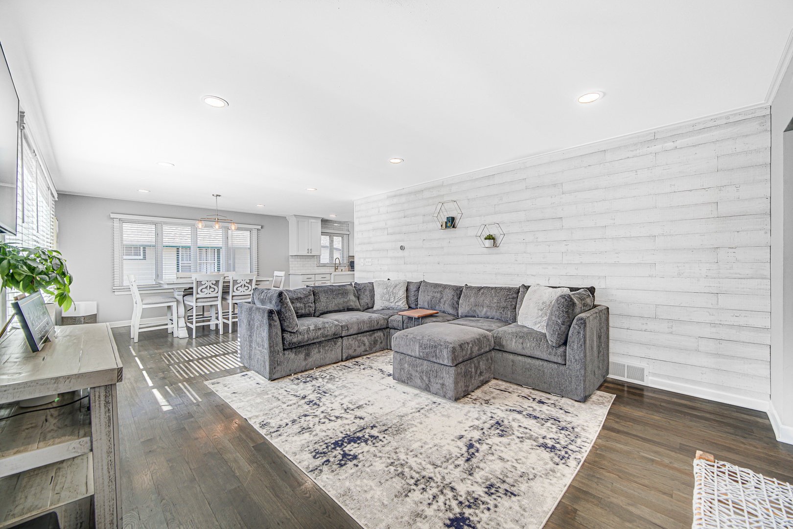 1634 Burr Oak Road Homewood, IL 60430 - Photo 11 of 36 a living room with furniture wooden floor and a rug