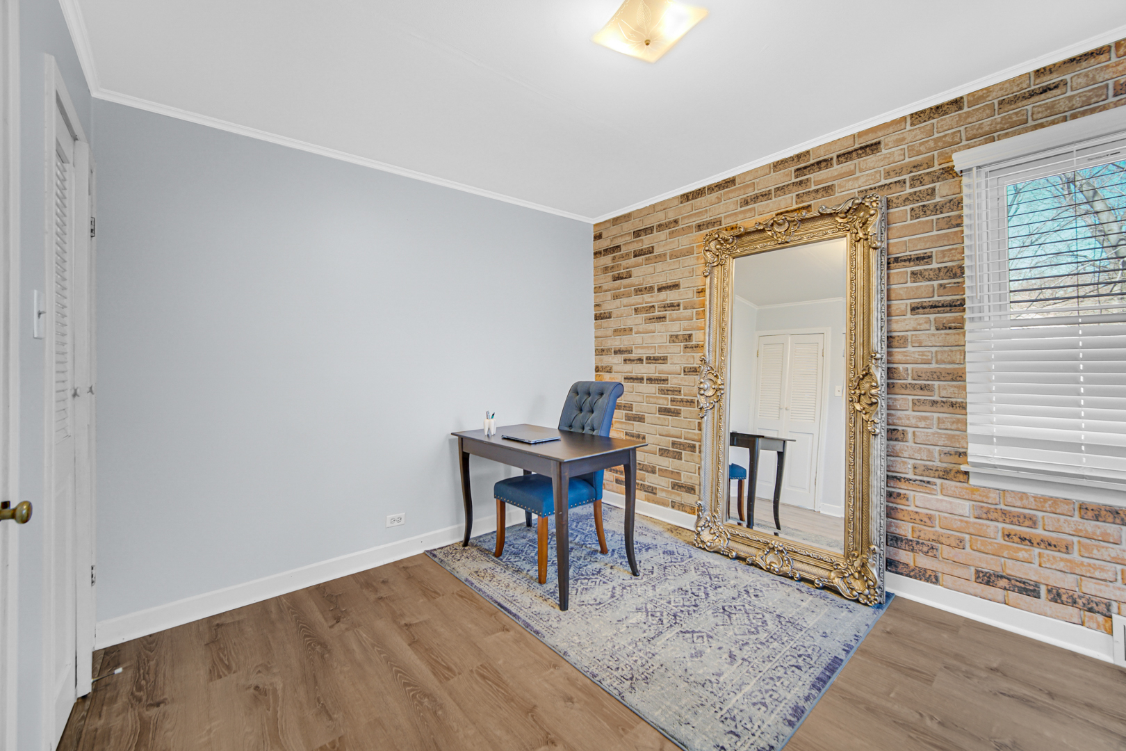 1634 Burr Oak Road Homewood, IL 60430 - Photo 26 of 36 a workspace with furniture and a fireplace