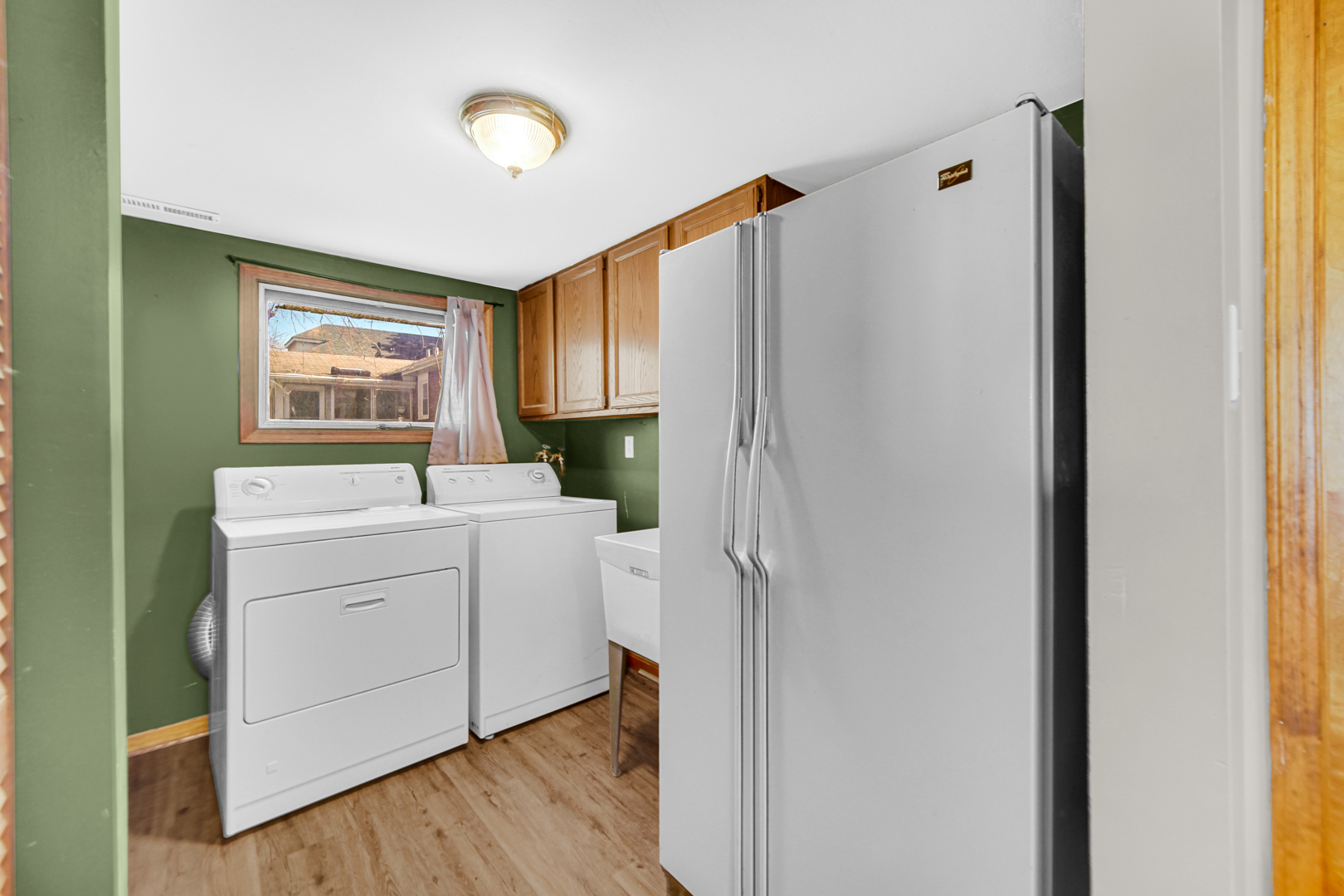 1634 Burr Oak Road Homewood, IL 60430 - Photo 27 of 36 a view of cabinets with wooden floor and furniture