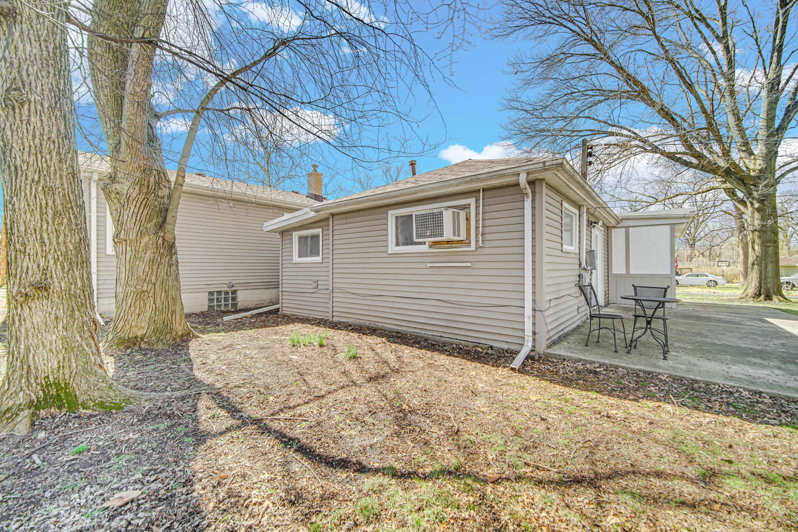 1634 Burr Oak Road Homewood, IL 60430 - Photo 31 of 36 a view of a house with a patio