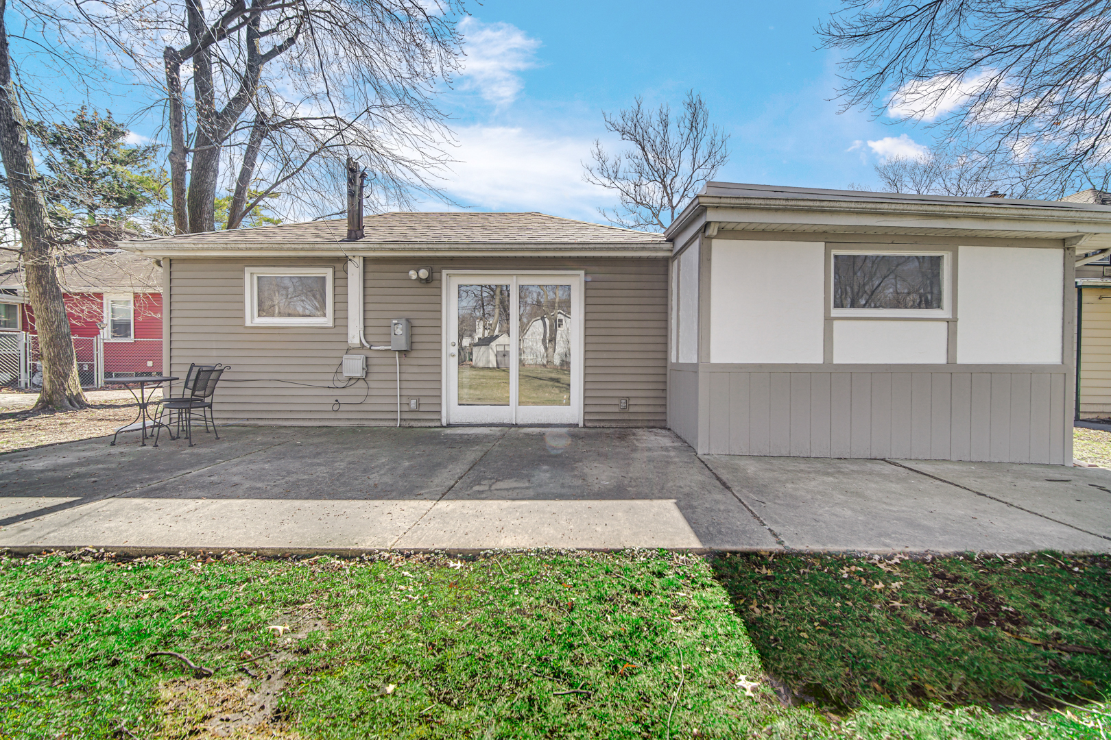 1634 Burr Oak Road Homewood, IL 60430 - Photo 34 of 36 a front view of a house with a yard and garage