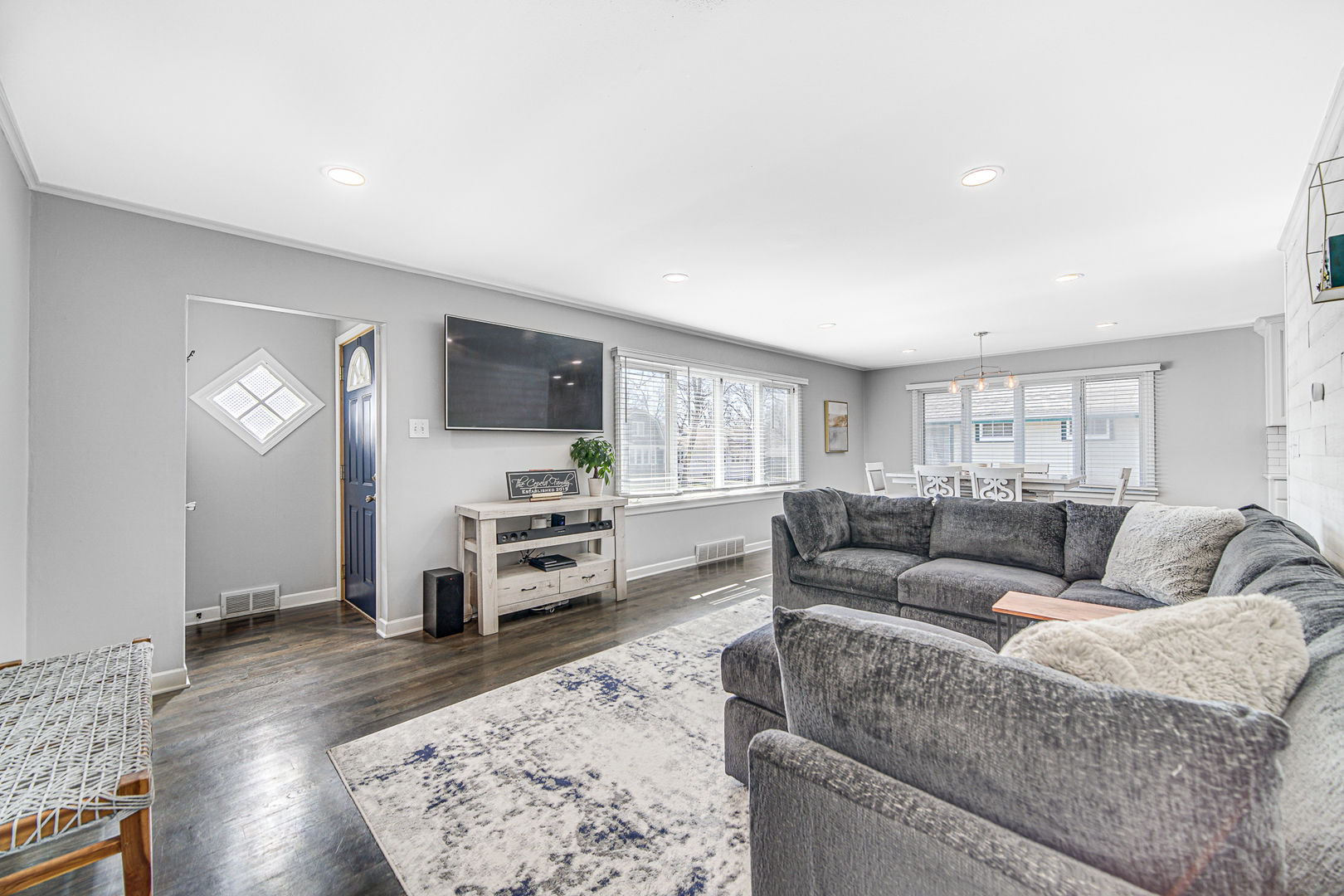 1634 Burr Oak Road Homewood, IL 60430 - Photo 10 of 36 a living room with furniture and a flat screen tv