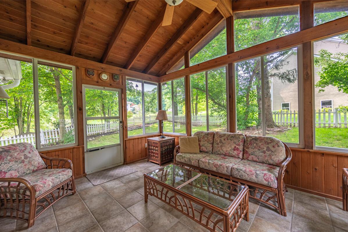 6340 Bale Kenyon Road Lewis Center, OH 43035 - Photo 24 of 41 Screened porch with rustic cedar finish and cathedral ceiling