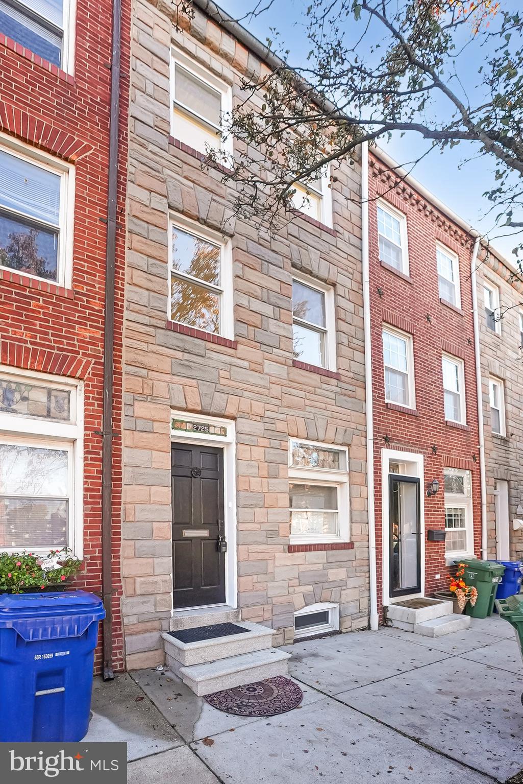 2725 Hudson Street Baltimore, MD 21224 - Photo 1 of 66 a front view of a brick building with many windows