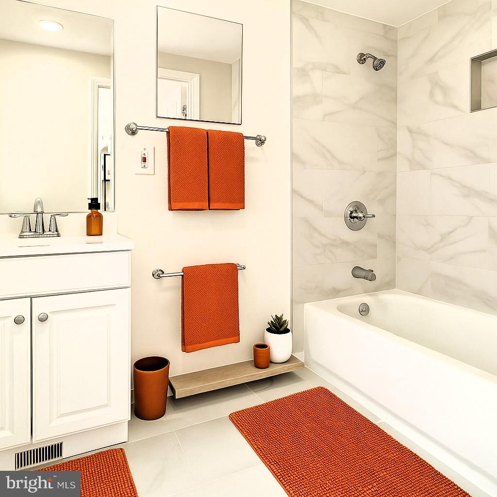 2725 Hudson Street Baltimore, MD 21224 - Photo 11 of 66 a bathroom with a tub sink and toilet