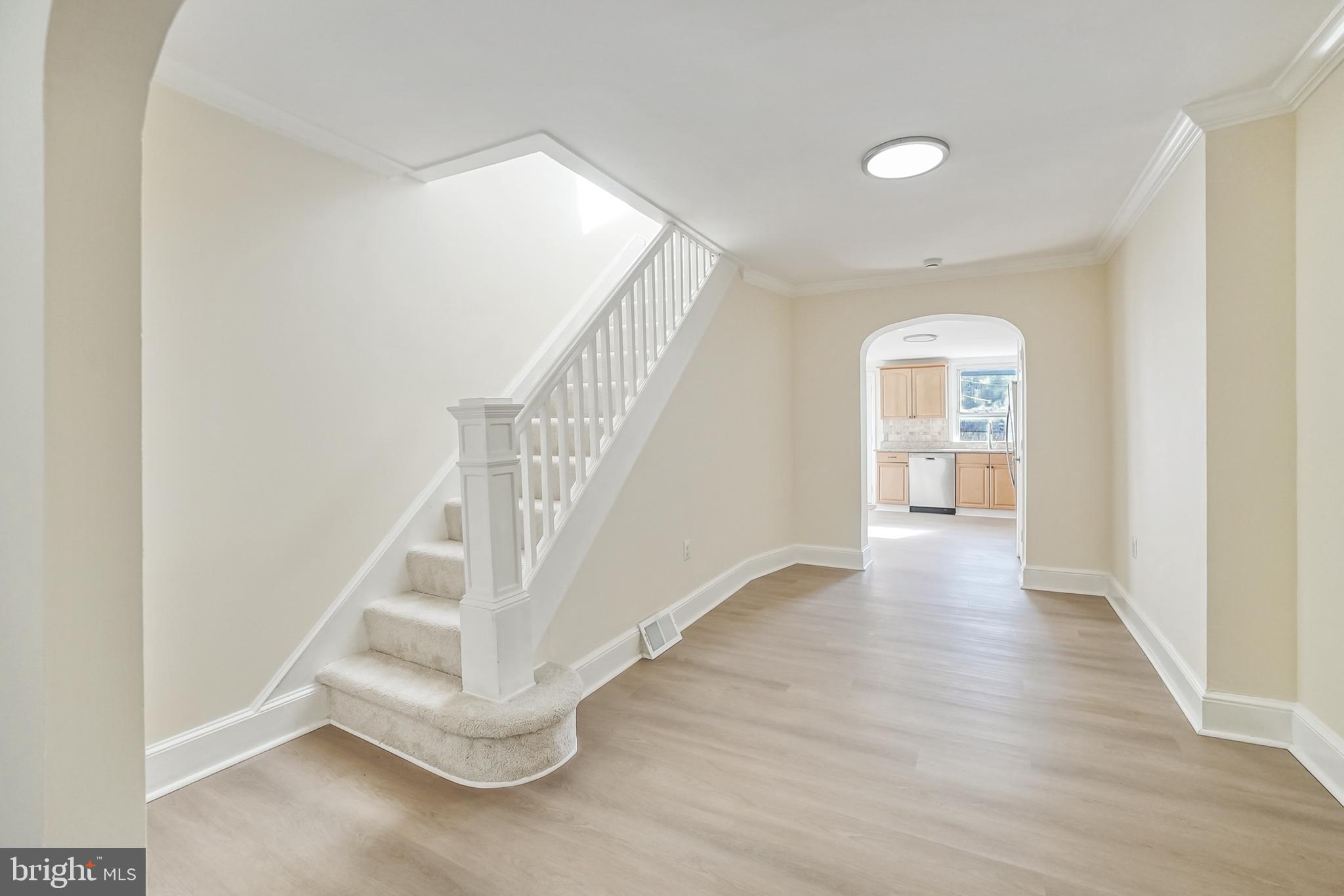 2725 Hudson Street Baltimore, MD 21224 - Photo 17 of 66 a view of entryway and hall with wooden floor