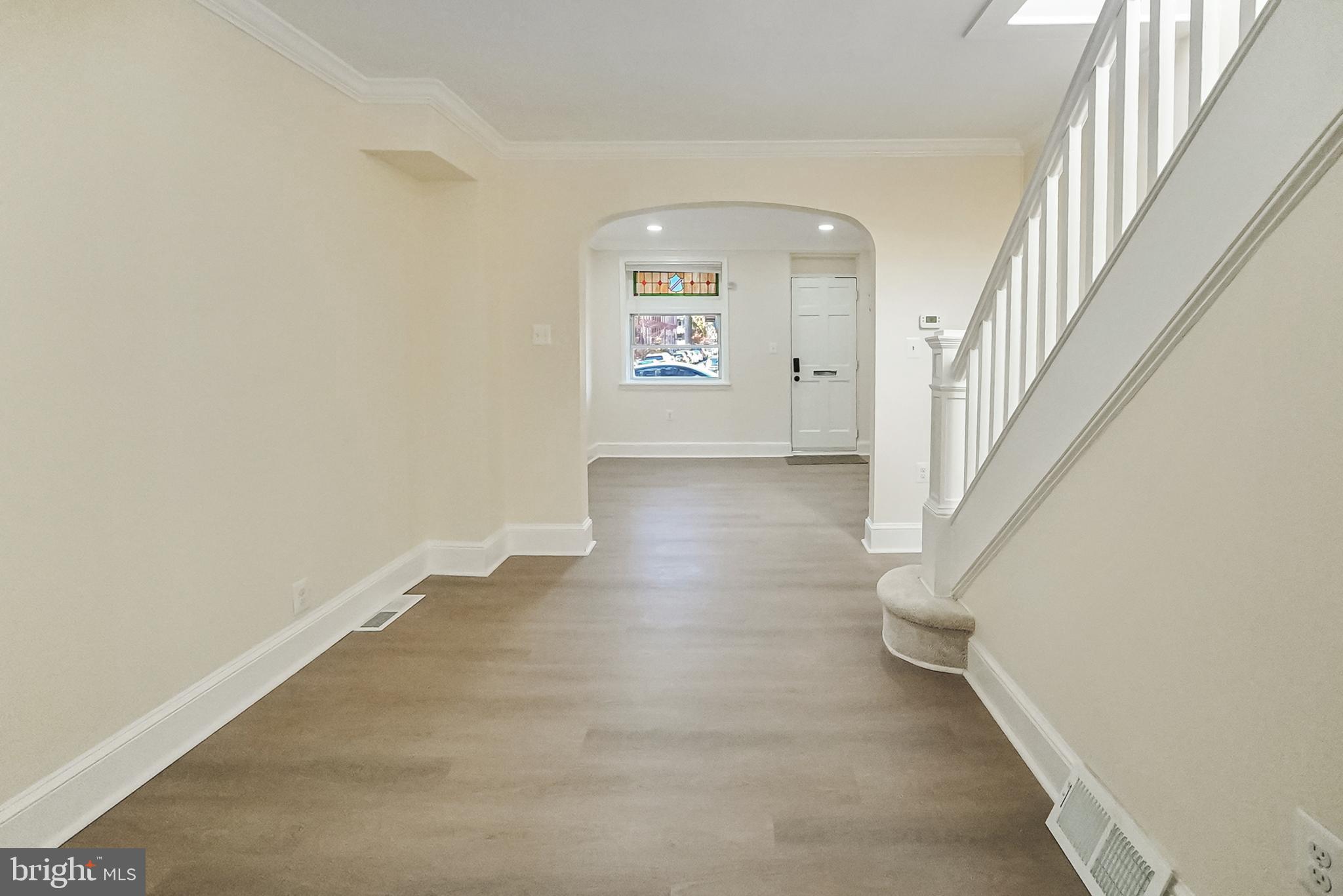 2725 Hudson Street Baltimore, MD 21224 - Photo 19 of 66 a view of entryway with stairs