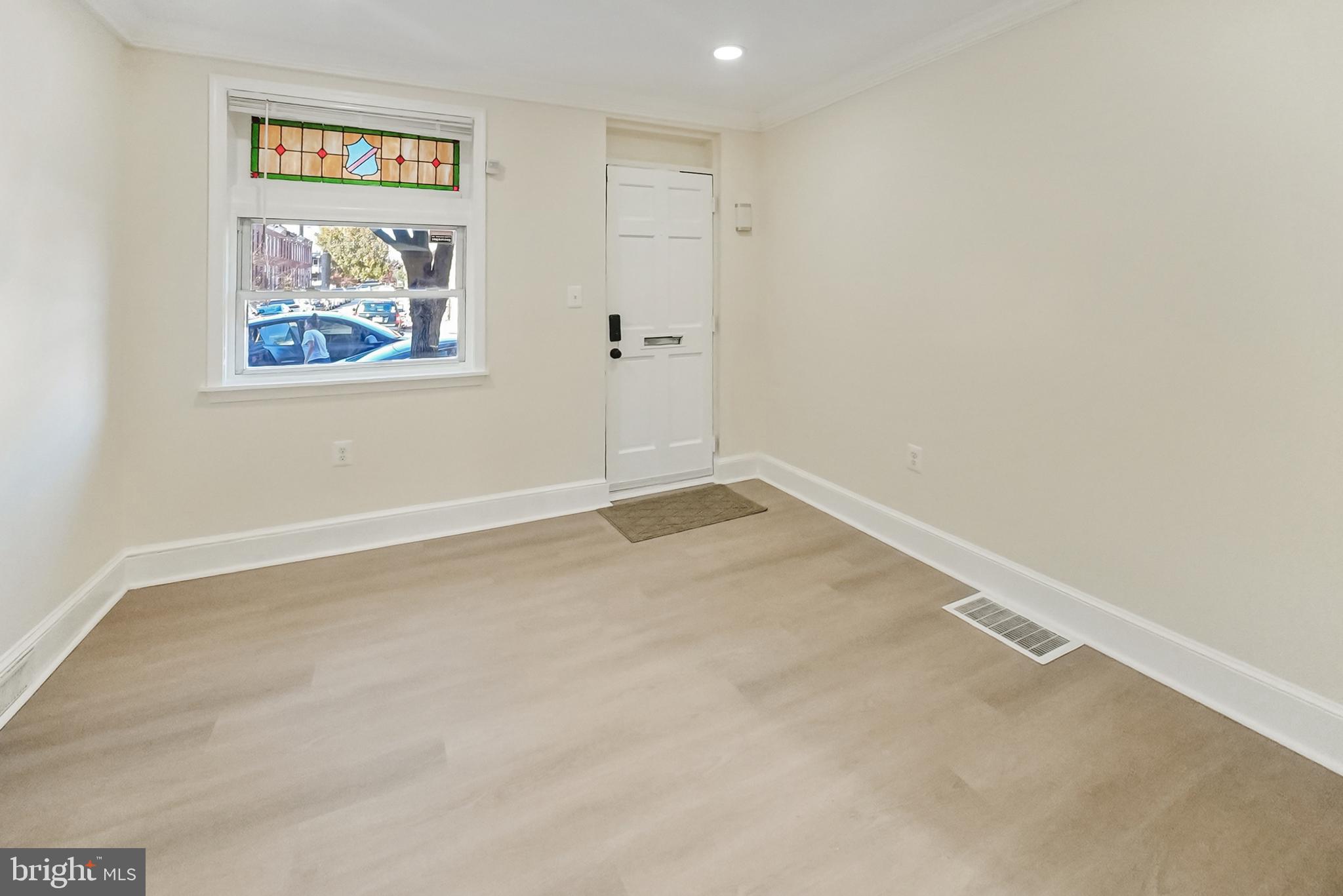 2725 Hudson Street Baltimore, MD 21224 - Photo 22 of 66 an empty room with a window