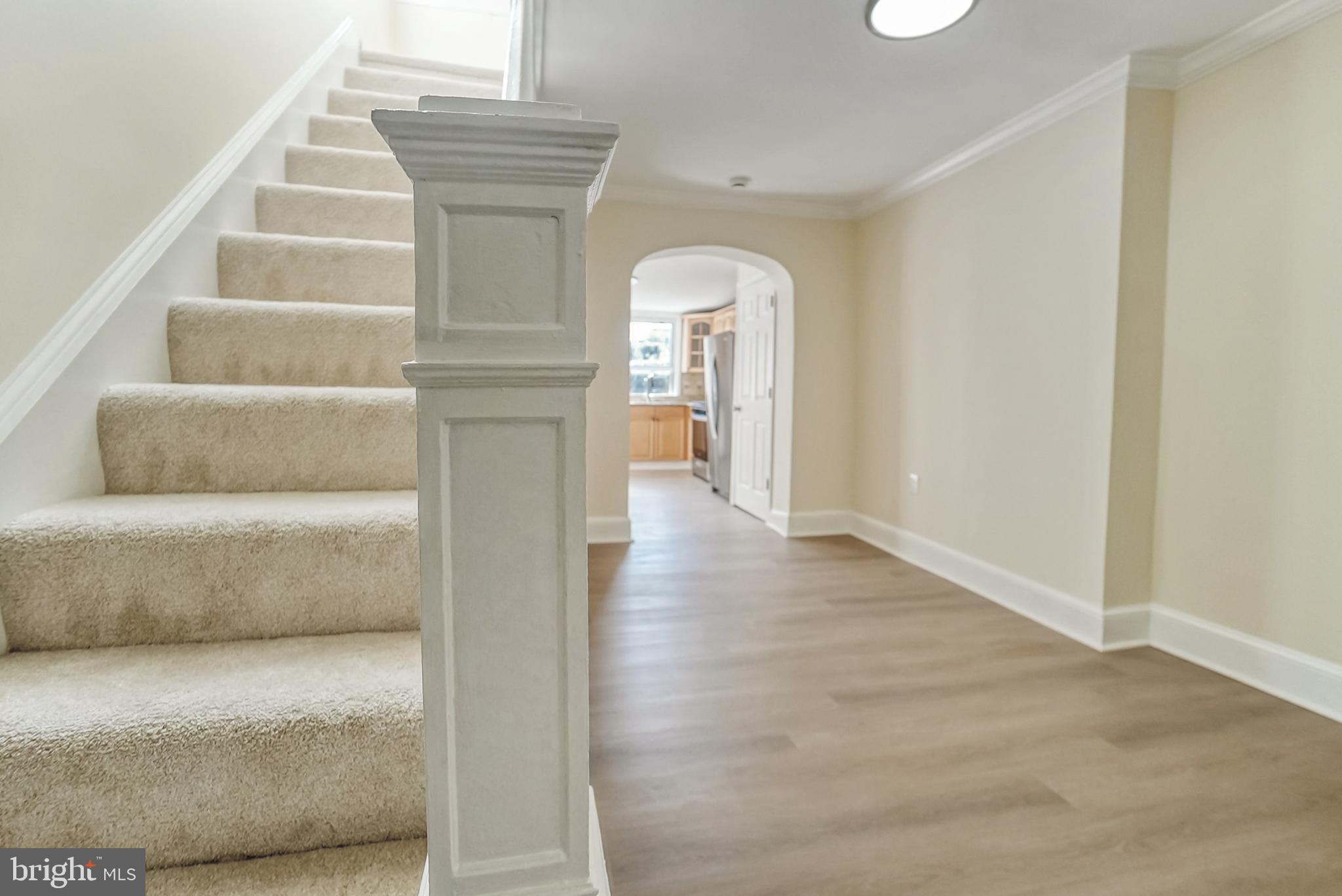 2725 Hudson Street Baltimore, MD 21224 - Photo 35 of 66 a view of entryway and hall with wooden floor
