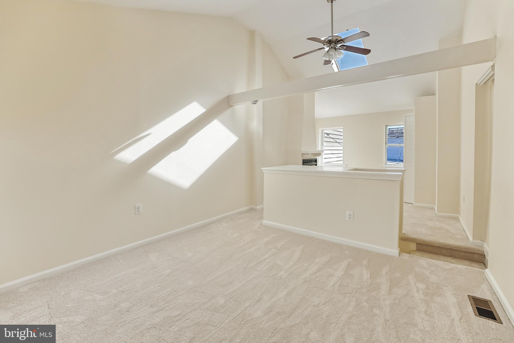 2725 Hudson Street Baltimore, MD 21224 - Photo 47 of 66 an empty room with windows and fan