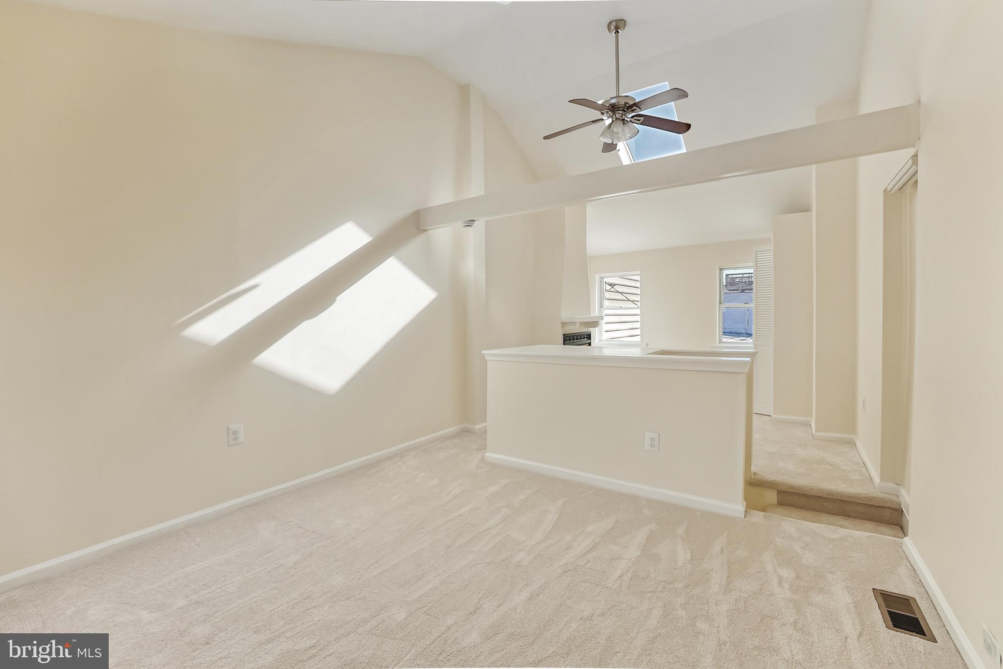2725 Hudson Street Baltimore, MD 21224 - Photo 51 of 66 a view of a room with window and a ceiling fan