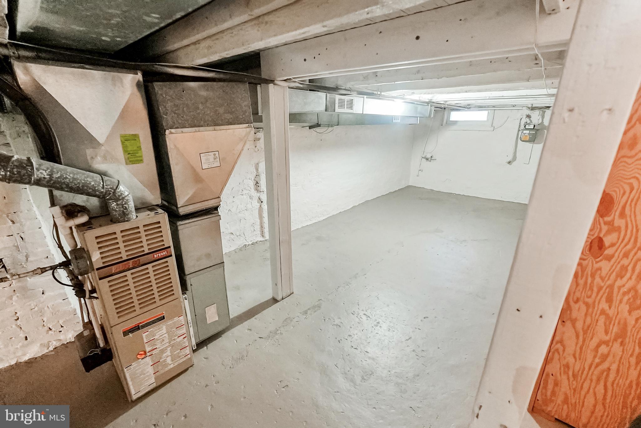 2725 Hudson Street Baltimore, MD 21224 - Photo 57 of 66 a view of an empty room with wooden floor